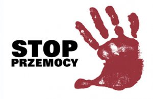 Napis Stop przemocy. Obok niego odbitka dłoni ludzkiej w kolorze bordowym